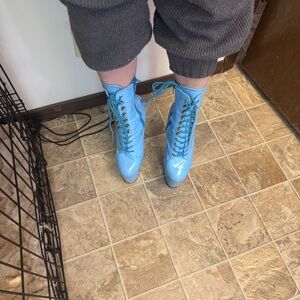 Blue Heeled Boots with Lace-Up Design